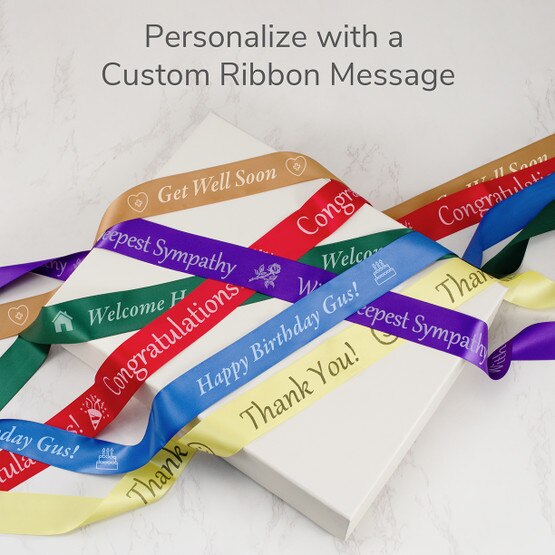 ribbon with personalized text in the colors brown, blue, green, and purple